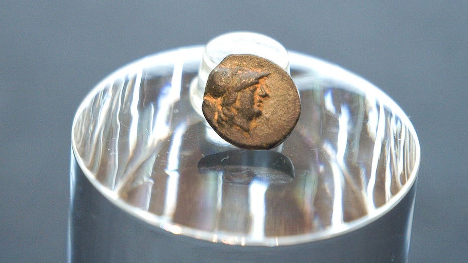 Teen stumbles on mysterious coin from legendary city, puzzling archaeologists over its journey Cairns Accountant